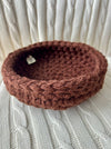 Handmade brown Formation Nest for story-based play and character formation.