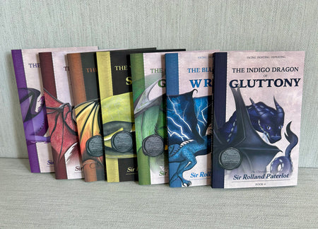 Seven Deadly Dragons virtue book set on gray textured background.
