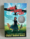 Book cover of The War That Saved My Life by Kimberly Brubaker Bradley, showing a young girl walking with crutches through a countryside scene beneath a flying WWII plane.